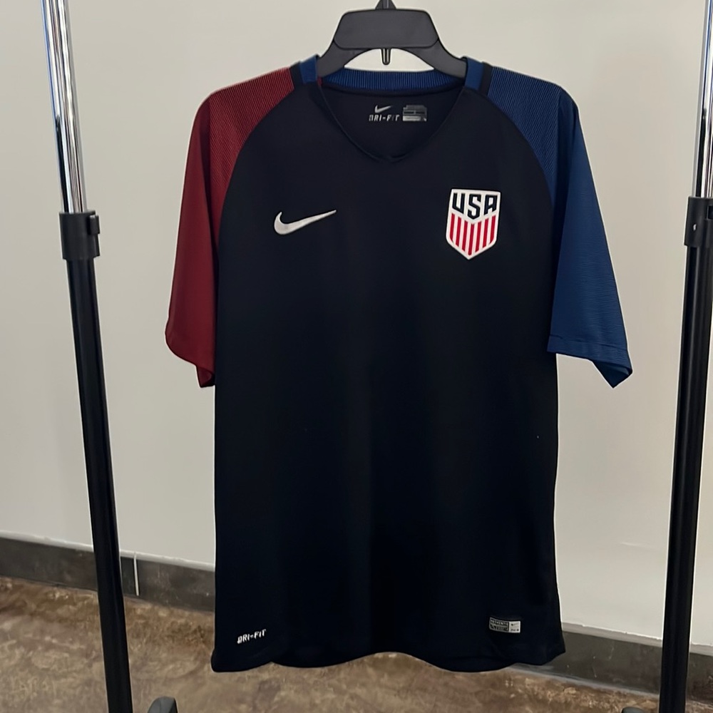 Nike USA shirt.